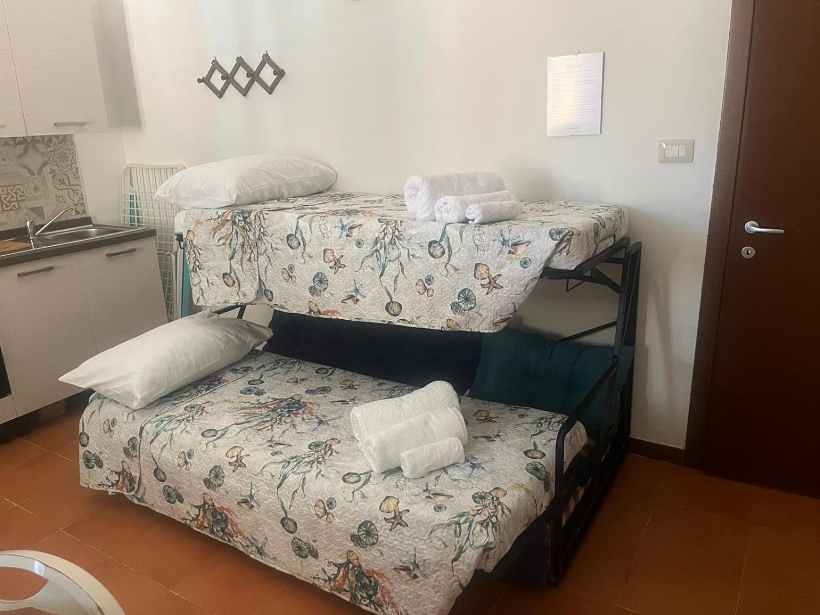 Moncici House Hotel Porto Torres Bagian luar foto